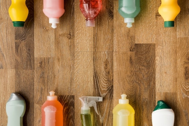 A close-up shot of various eco-friendly cleaning product labels. Prominently featured are certifications like the 