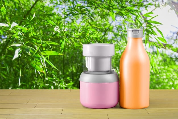A close-up shot of various reusable containers and utensils, such as stainless steel water bottles, bamboo cutlery, and glass food containers, set against a natural background.