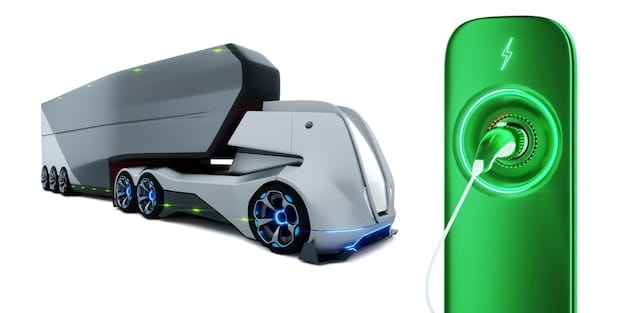 A green hydrogen powered truck refuelling at a hydrogen station