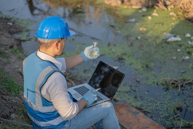A network of interconnected sensors and monitoring devices along a riverbank, transmitting real-time water quality data to a central monitoring station displayed on a laptop screen.