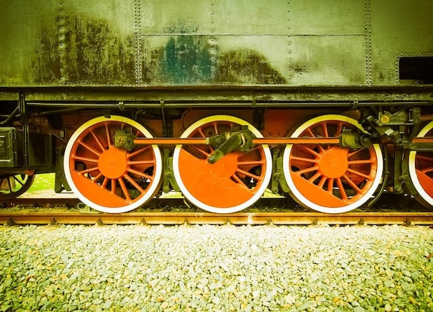 An artistic rendering of a Small Modular Reactor (SMR) being transported on a train, showcasing its modular design and ease of transport. The background should feature a rural landscape with wind turbines in the distance, symbolizing the integration of SMRs into a diverse energy grid.